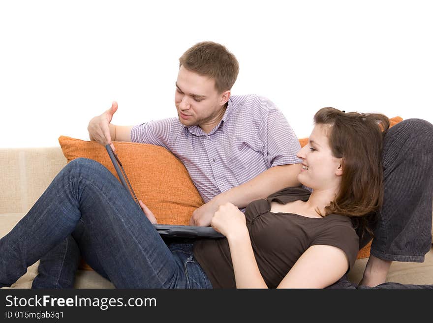 Casual couple together on sofa. Casual couple together on sofa