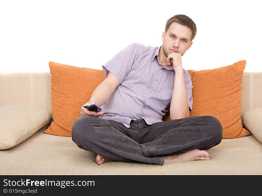 Casual man sitting on sofa. Casual man sitting on sofa