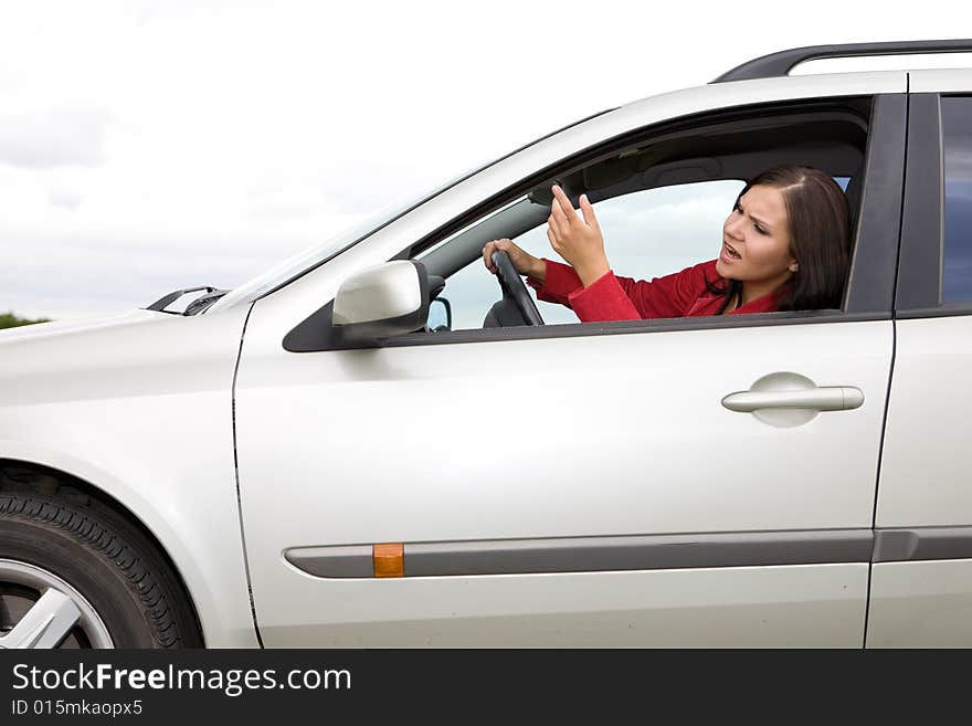 Casual woman traveling by car. Casual woman traveling by car