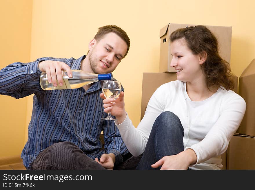 Happy casual couple in new home. Happy casual couple in new home