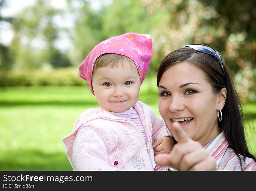 Happy family playing in park. Happy family playing in park