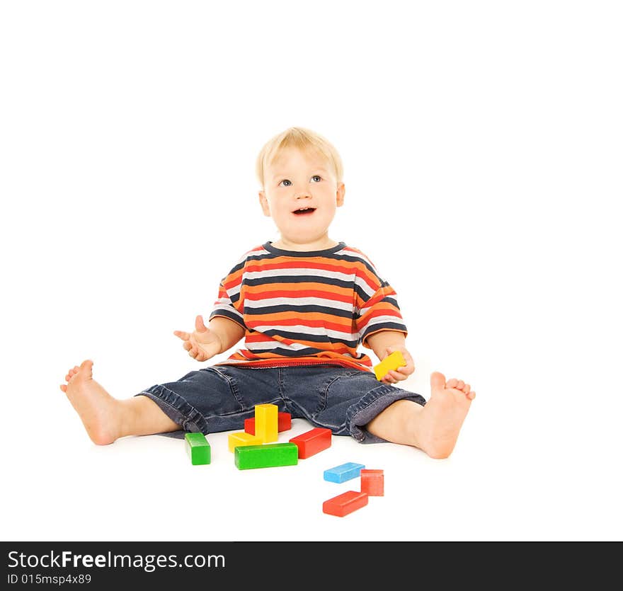 Beautiful young child playing intellectual game. Isolated on white background