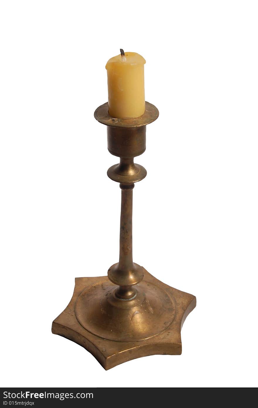 Candle within candlestick isolated on the white background