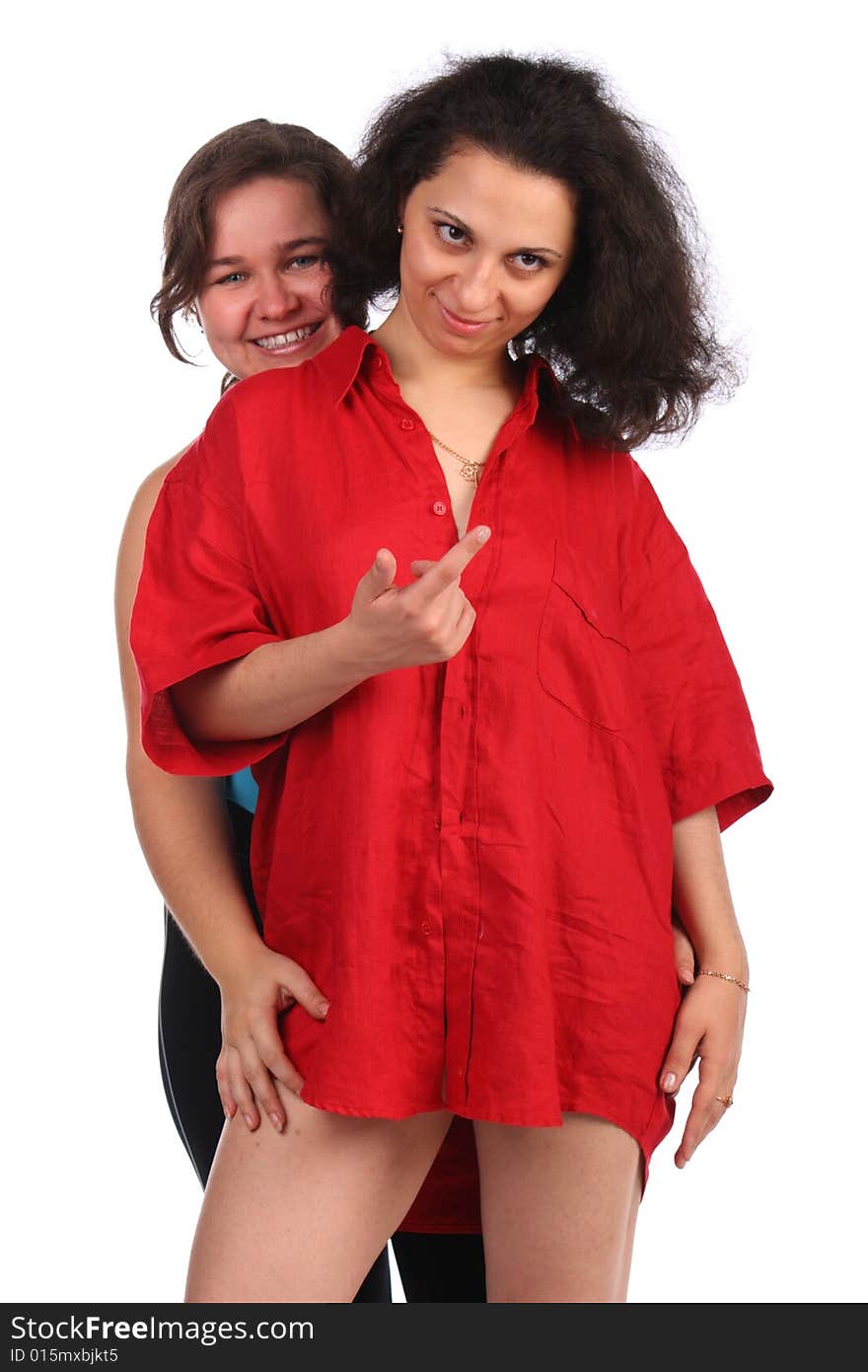 Two young woman embraces and beckon. Isolated.