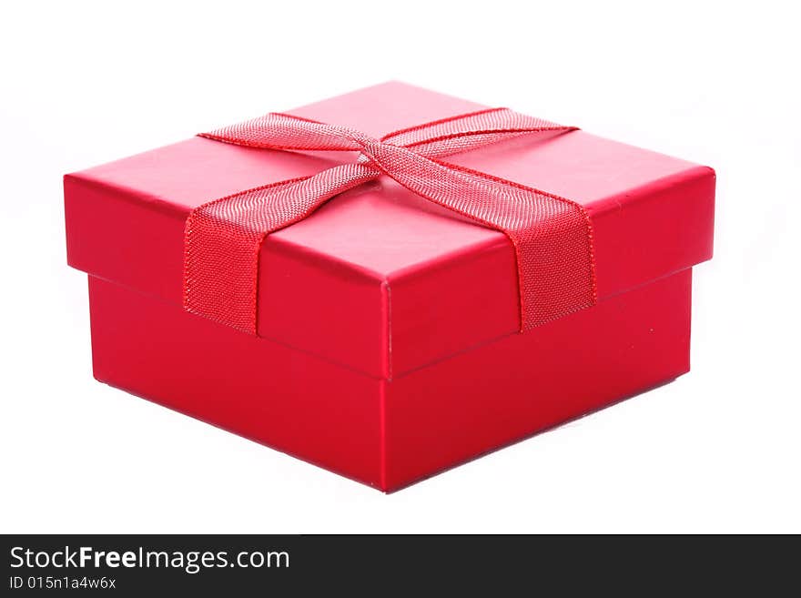 A red giftbox isolated on white. A red giftbox isolated on white