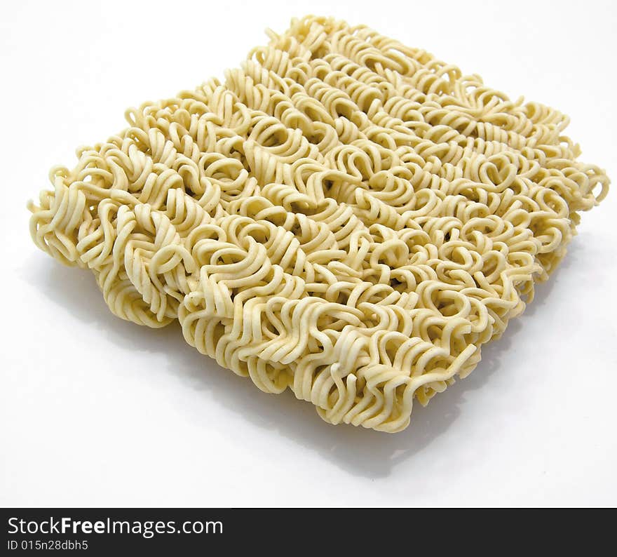 Un-cooked noodles on white. Un-cooked noodles on white