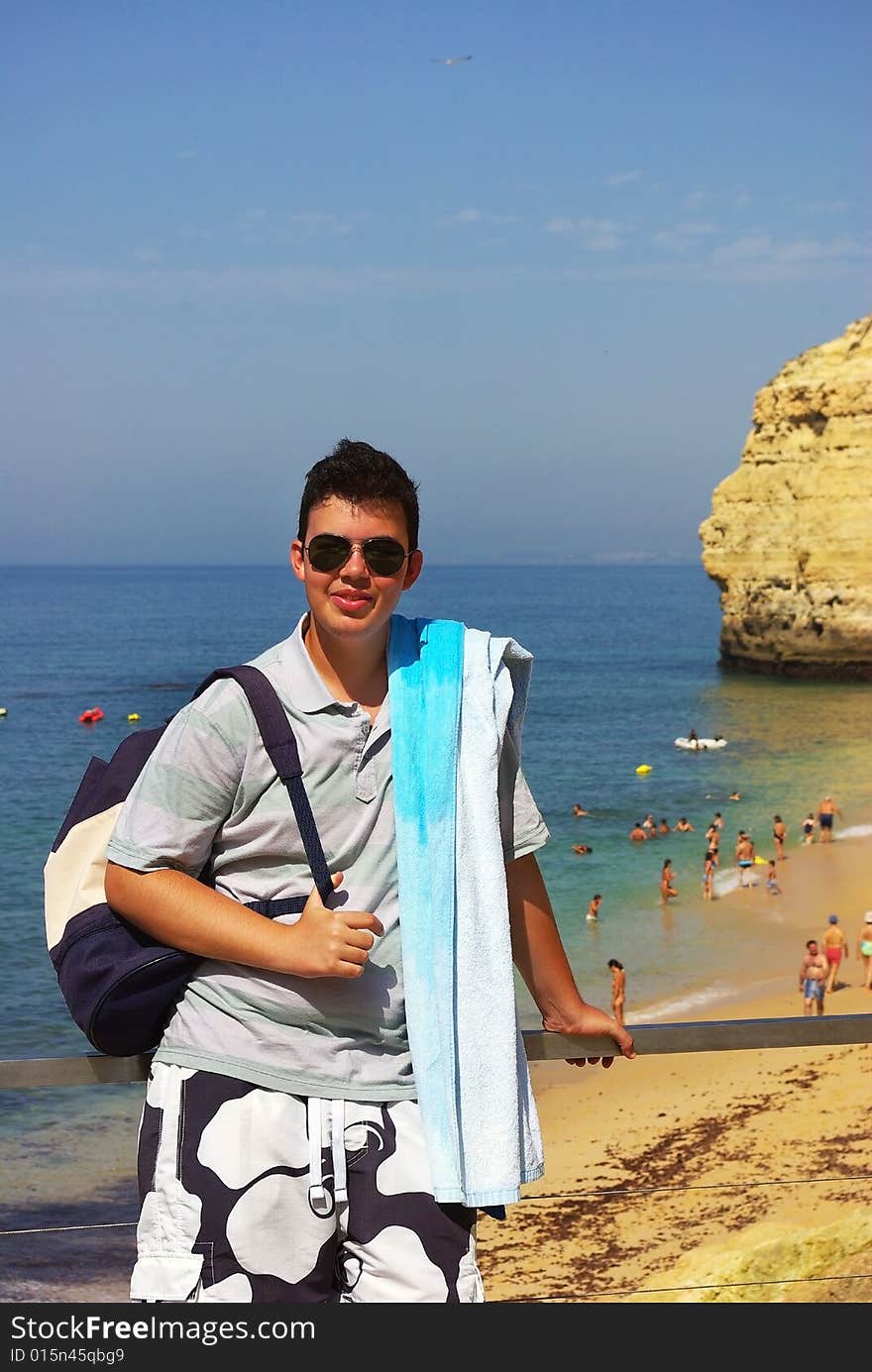 Young man next to sea.