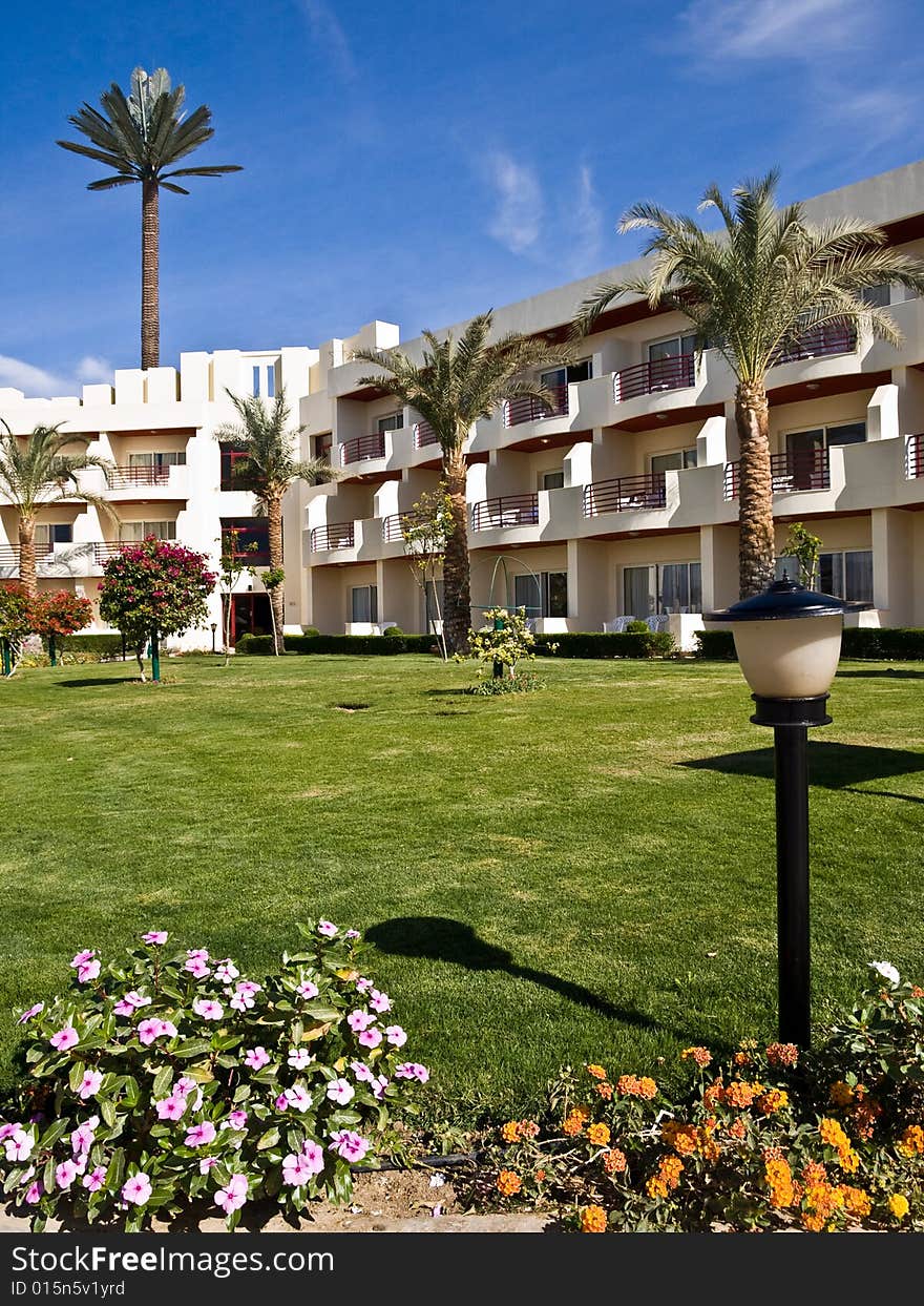 Building and palm trees in resort