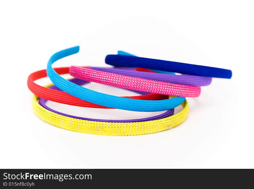 Colorful hair accessories on a white background. Colorful hair accessories on a white background