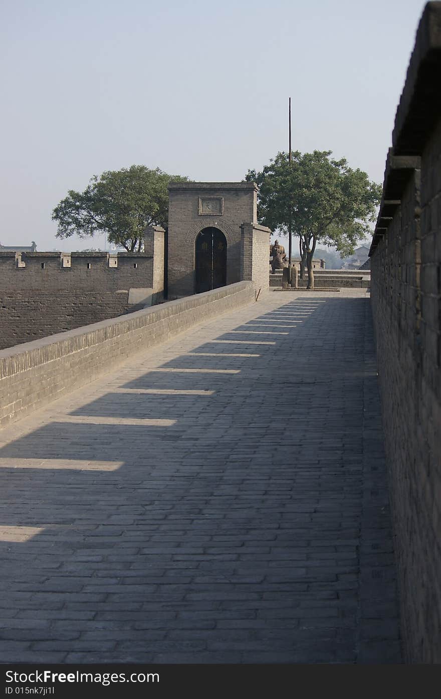 Ancient wall in China,Pavilion and trees on the Castle.