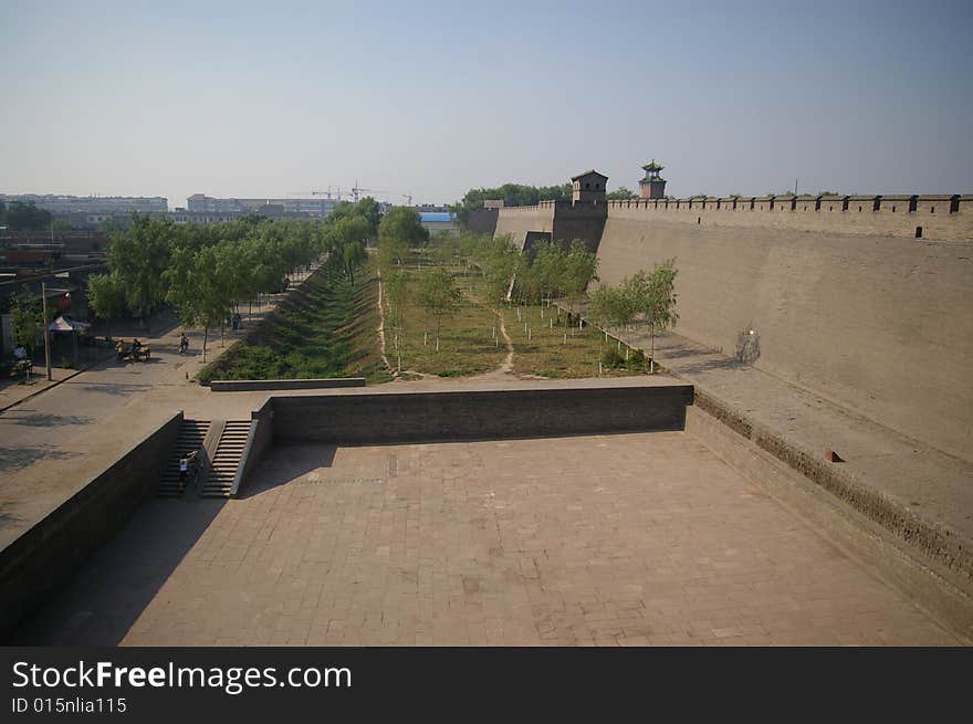 Ancient wall in China,Pavilion and trees on the Castle.