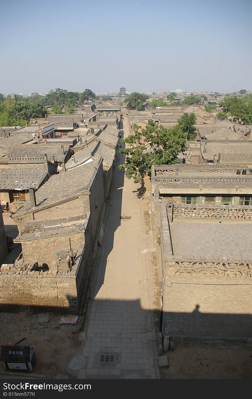 Ancient city Pingyao in China,old house and trees in the city. Ancient city Pingyao in China,old house and trees in the city.