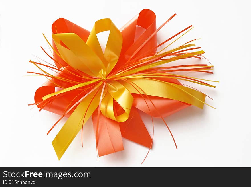 Red-Yellow-colored bow and ribbons. Red-Yellow-colored bow and ribbons