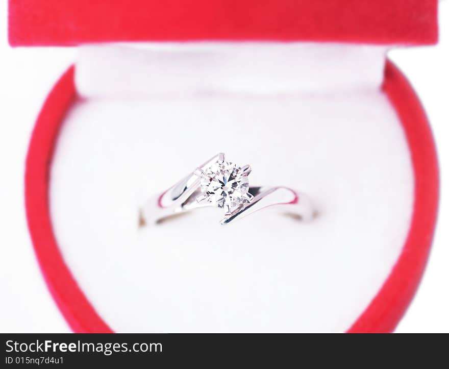 Close-Up Of Engagement Ring In Red Box, Top View