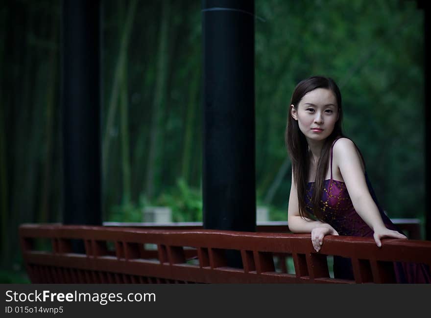 Bride in chinese traditional garden