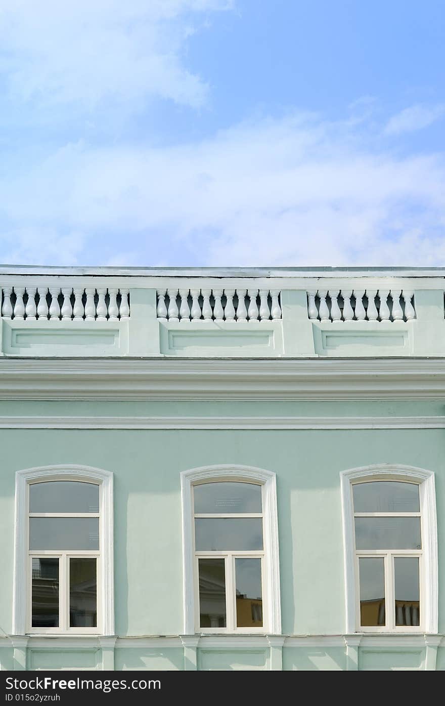 Close-up of a building with blue sky above