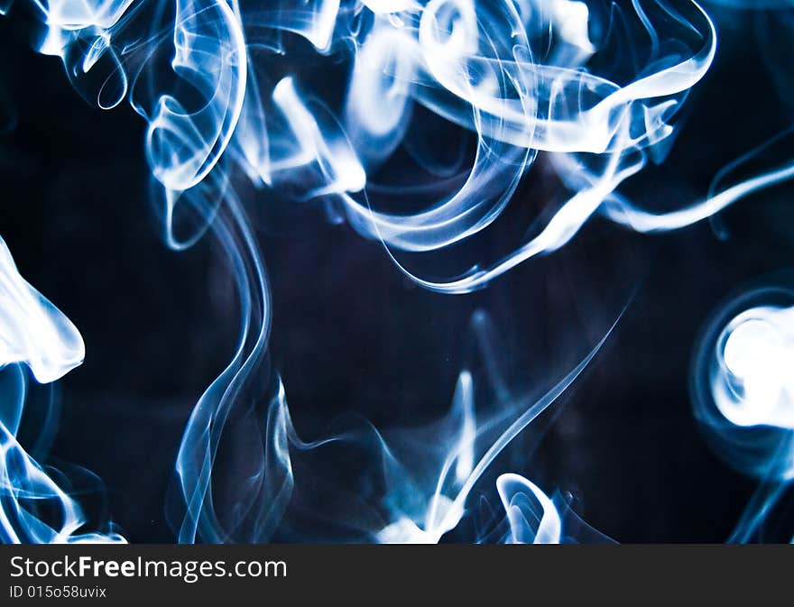 Abstract Blue Smoke Isolated On Black