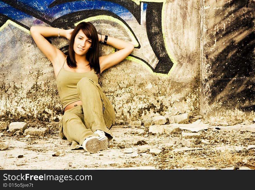 Young woman in casual clothing staring at camera.