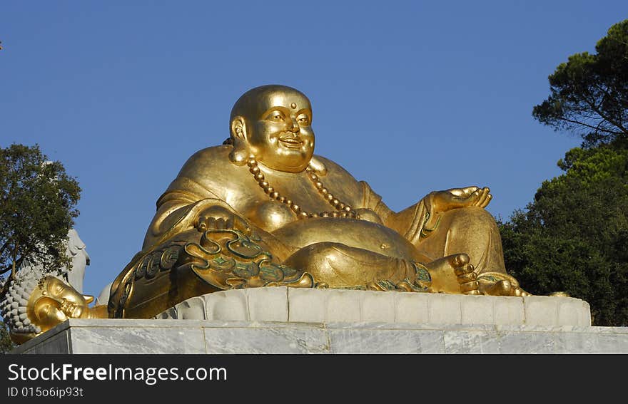 Buddha in the garden east of Qta. Loridos, Bombarral, Portugal