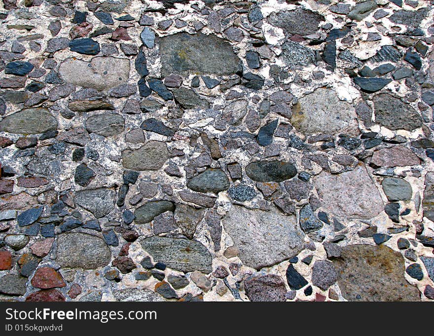 Old grey wall mede of stones. Old grey wall mede of stones