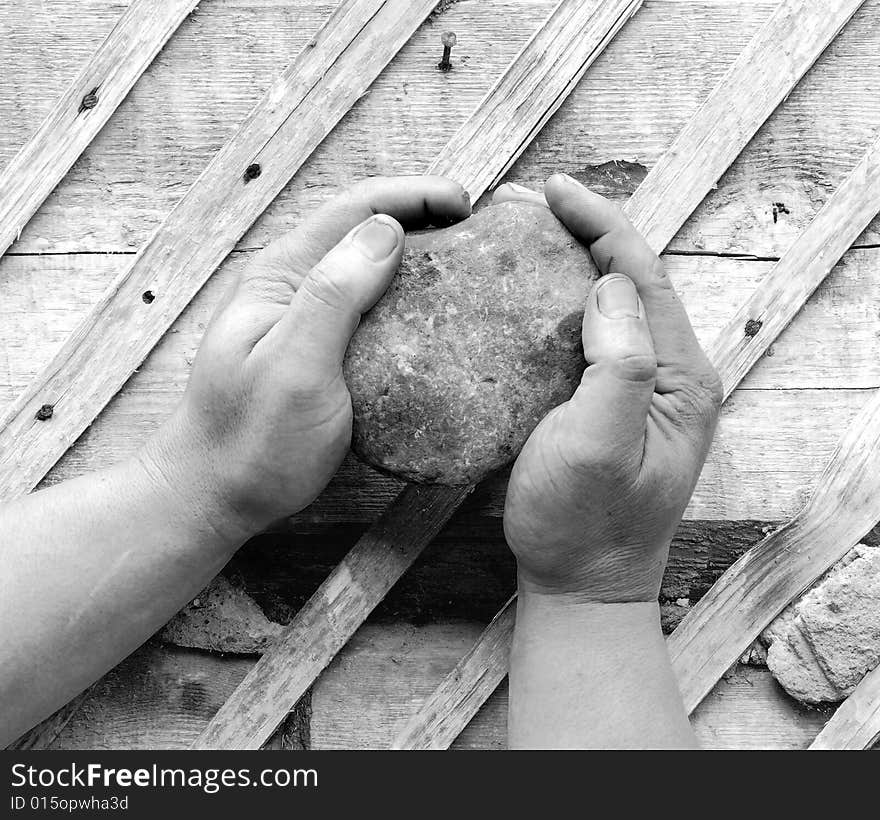 To put a corner stone. hands, black&wait