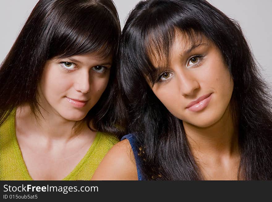 Two  Brunettes Close Up