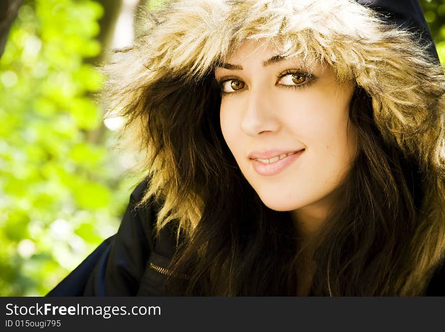 Woman portrait wearing a fur cap.