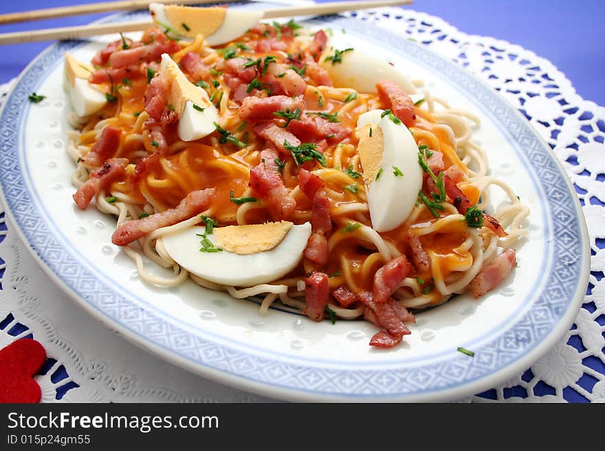 A philipine meal called palabok with noodles and eggs