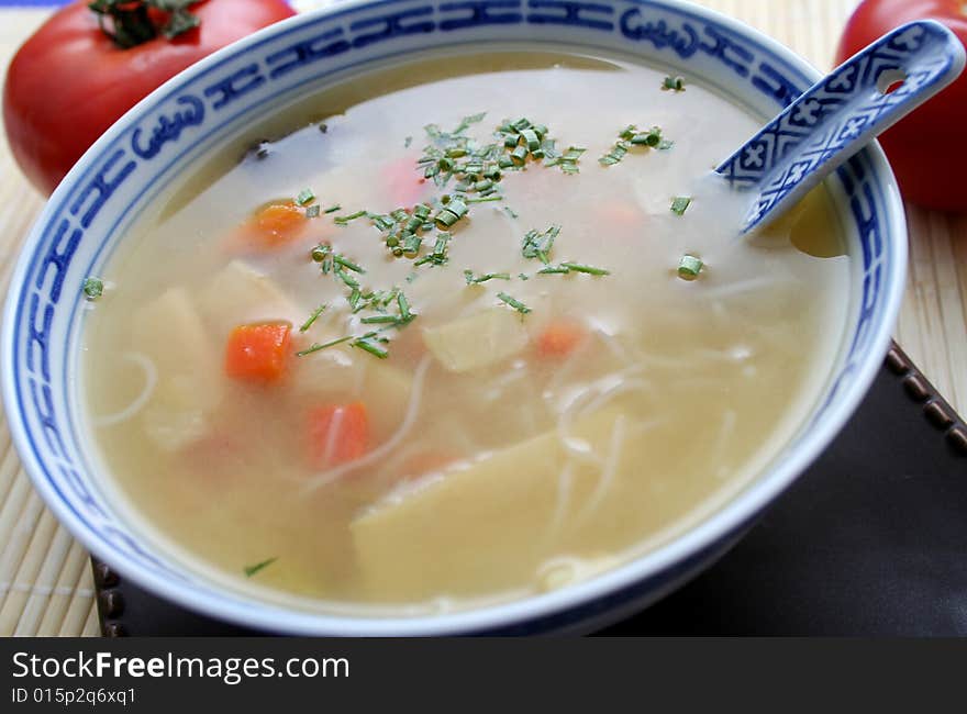 A asian meal with noodles and vegetables. A asian meal with noodles and vegetables