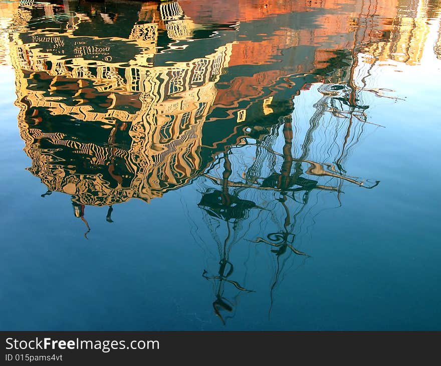 Water reflection of a 17th century clipper ship - Malaga, Spain.