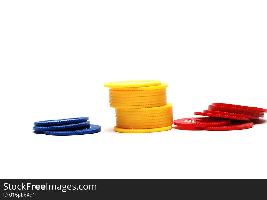 Stack of multi colored pocker chips isolated over white. Stack of multi colored pocker chips isolated over white