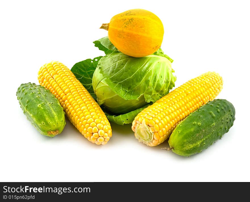 Green ripe and tasty useful yellow vegetables on white background