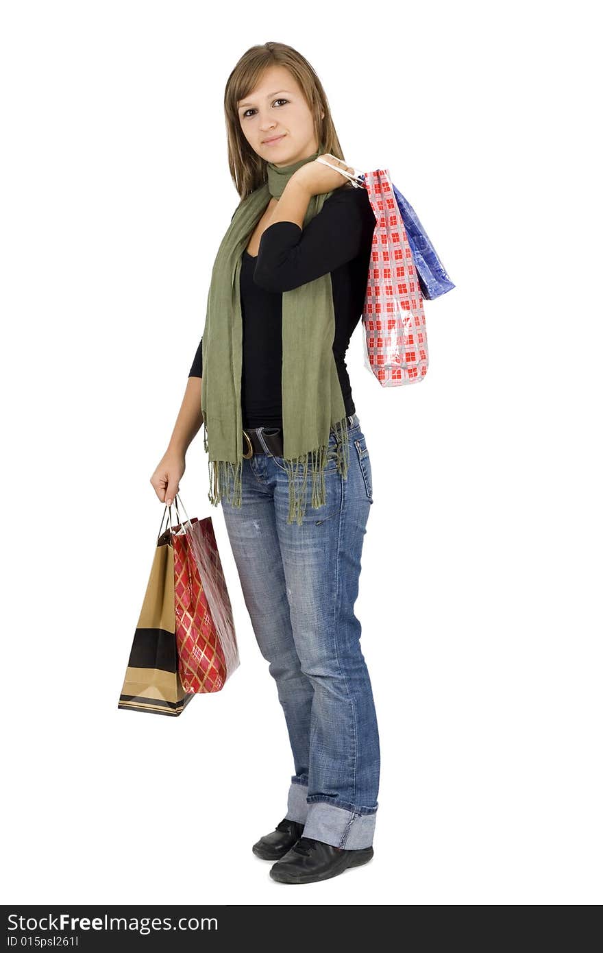 Happy girl holding shopping bags, isolated, on white background