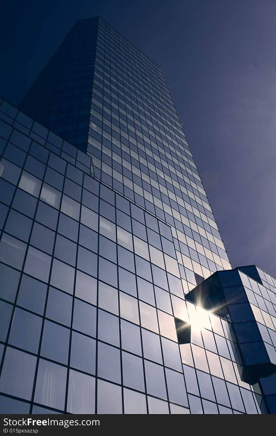 Office building on a background of the blue sky. Office building on a background of the blue sky