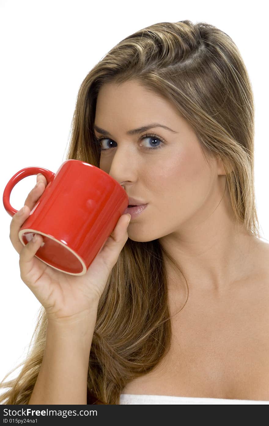 A lady drinking with coffee mug