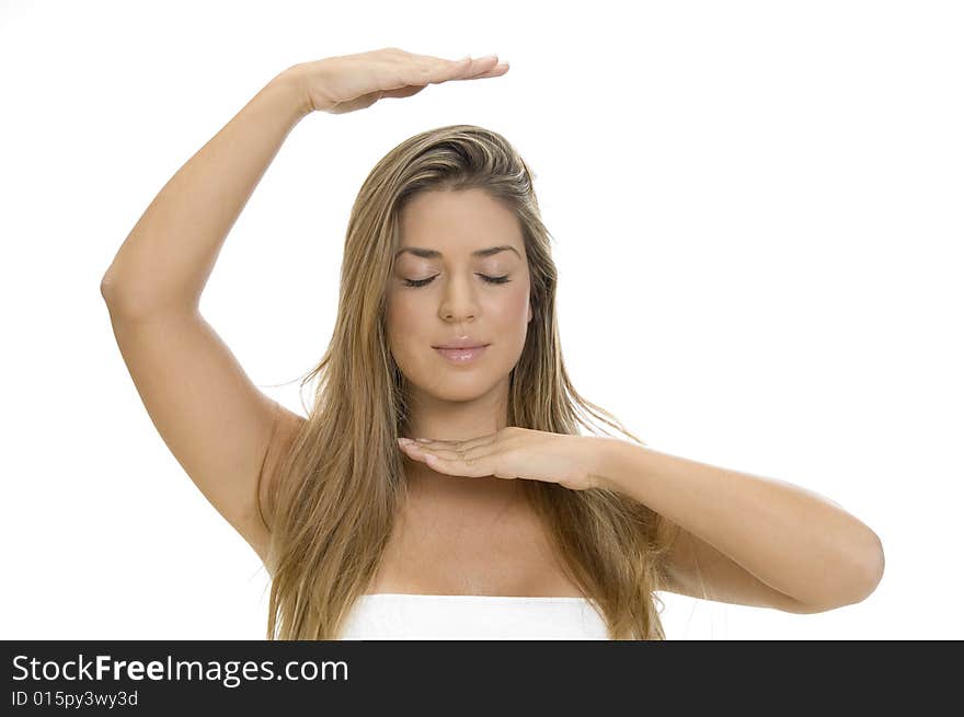 Woman doing yoga on an isolated white background