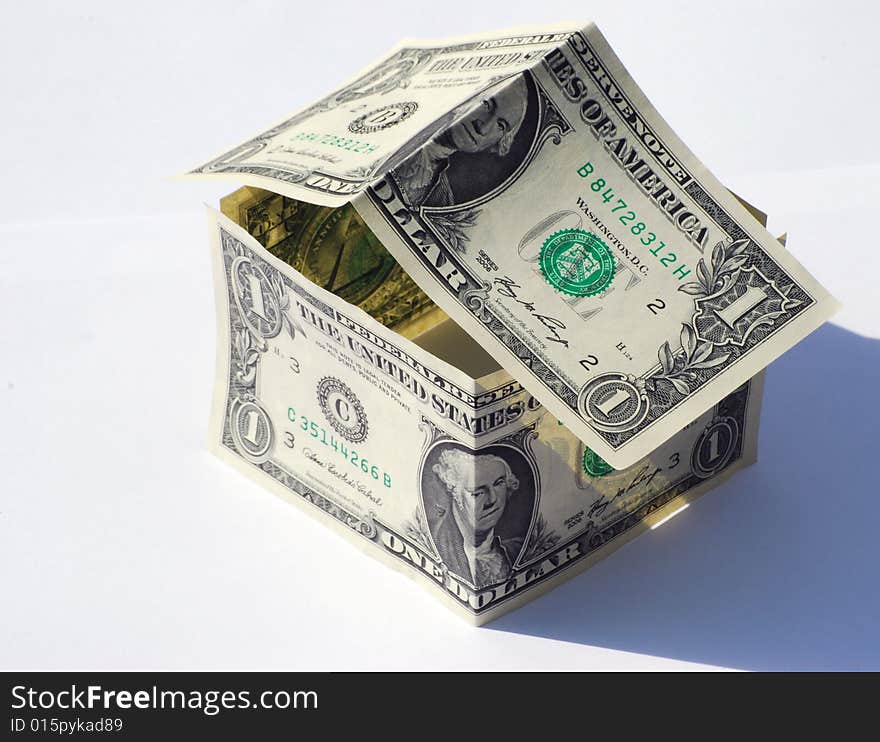 Conceptual image of house made from US dollars. Conceptual image of house made from US dollars