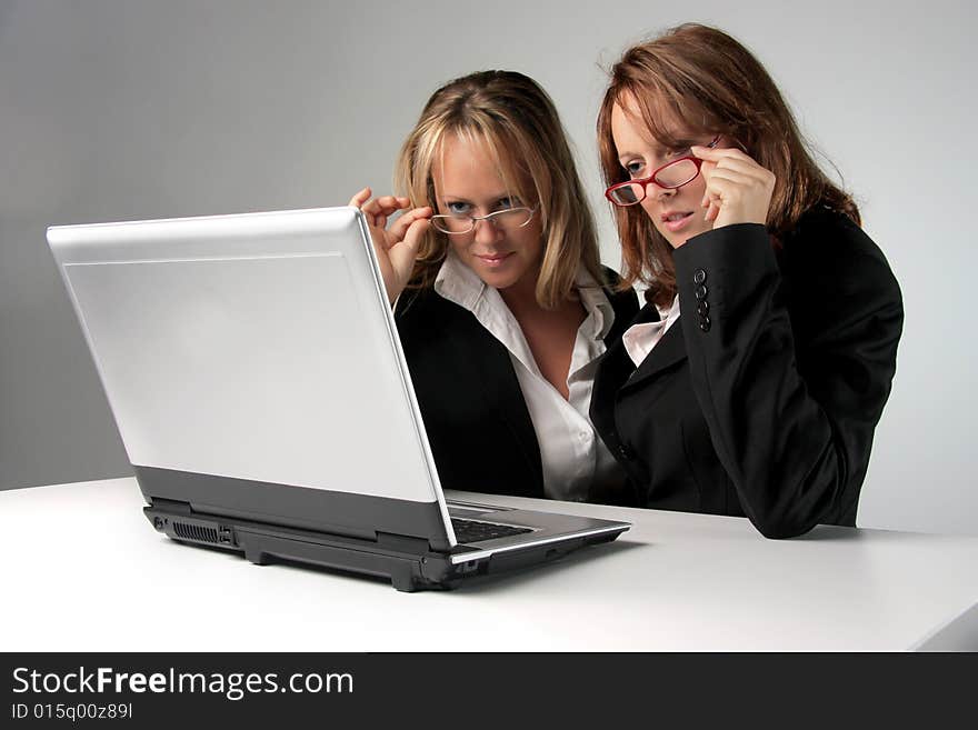 Two woman with a laptop. Two woman with a laptop