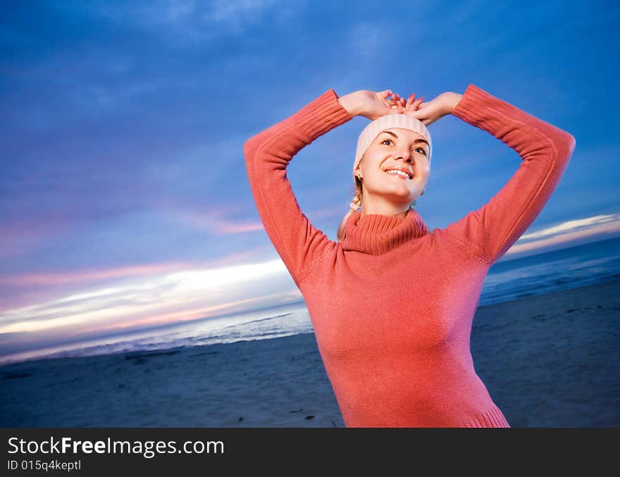 Woman Relaxing On A Beach