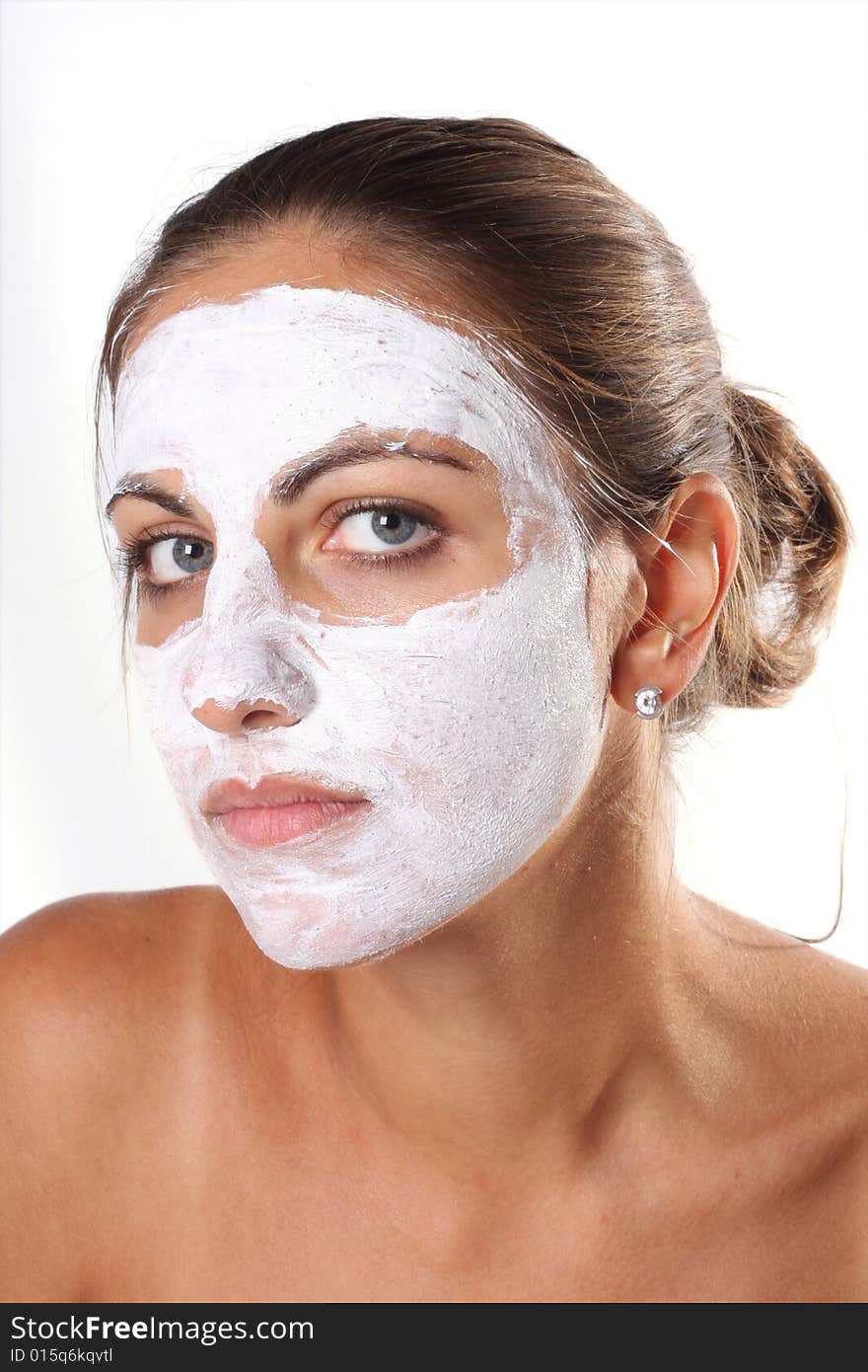 Beautiful woman with mask on a white background