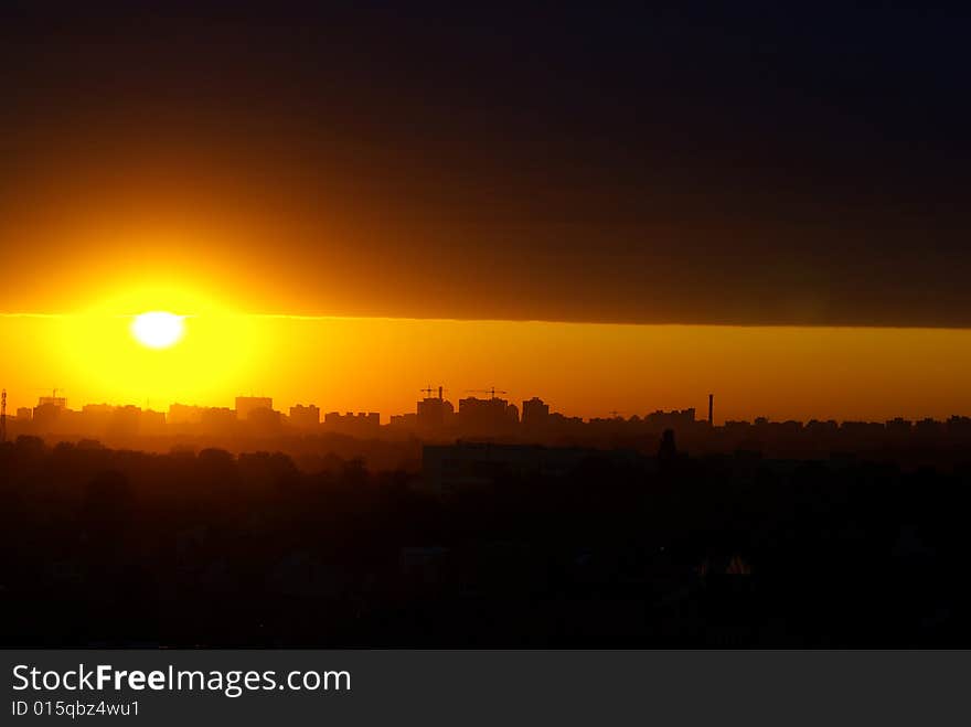 Evening sunset above modern city. Evening sunset above modern city