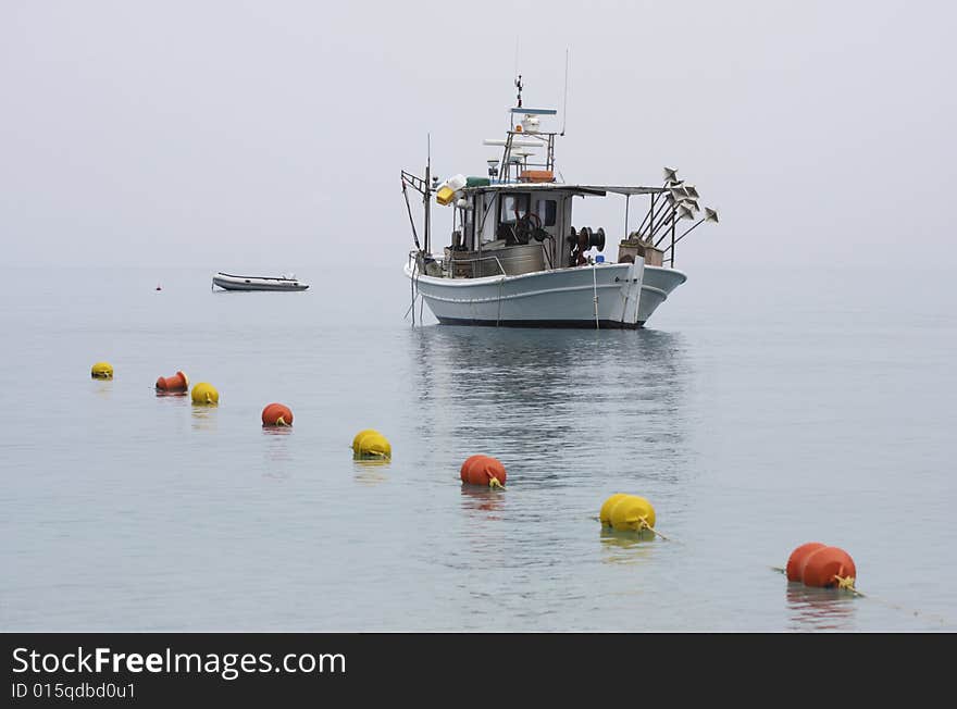 Fishermen s boat in calm