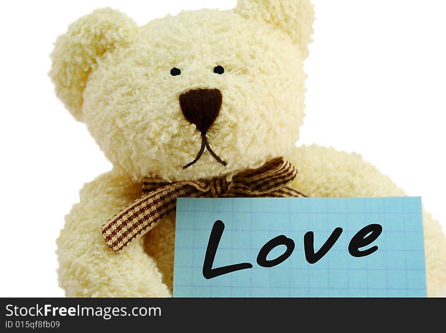 Front view of teddy bear toy with Love note, isolated on white background. Front view of teddy bear toy with Love note, isolated on white background