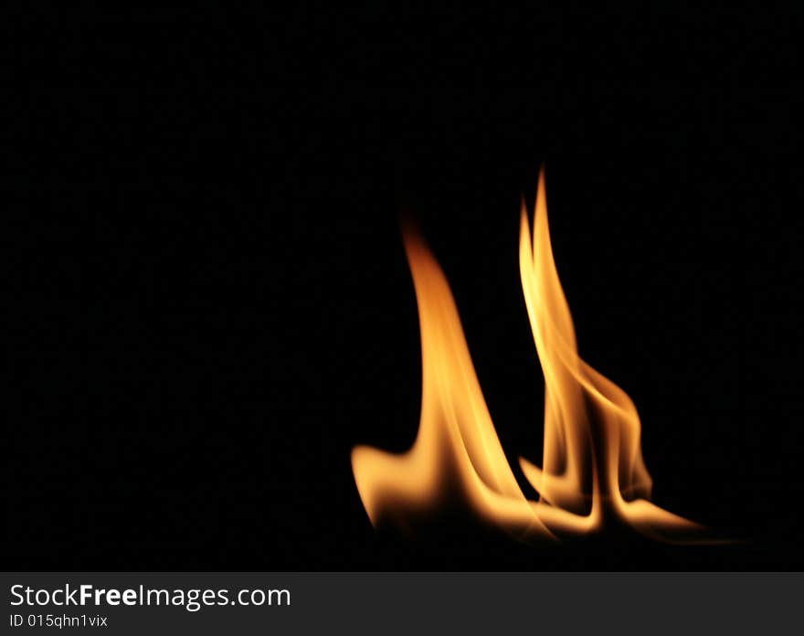 Flame isolated against a black background. Flame isolated against a black background