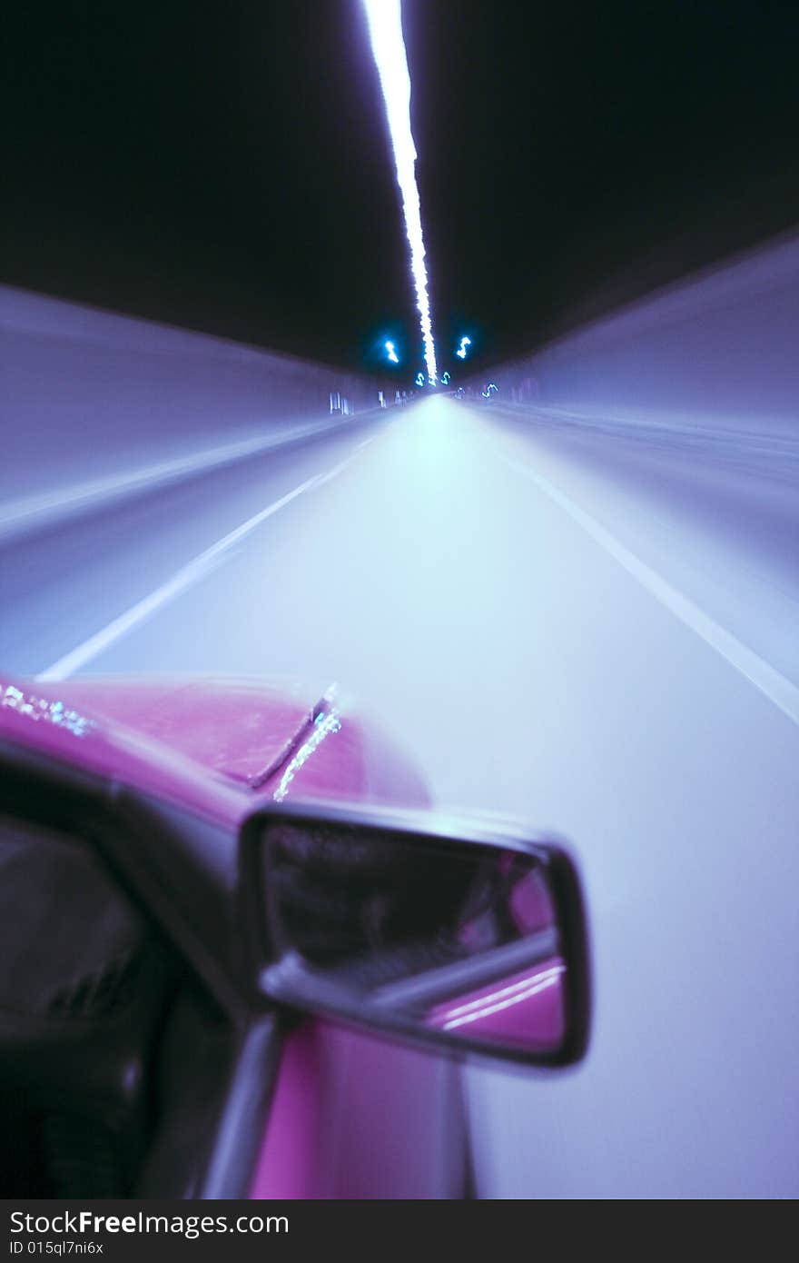 High speed car in a tunnel - abstract blue colors