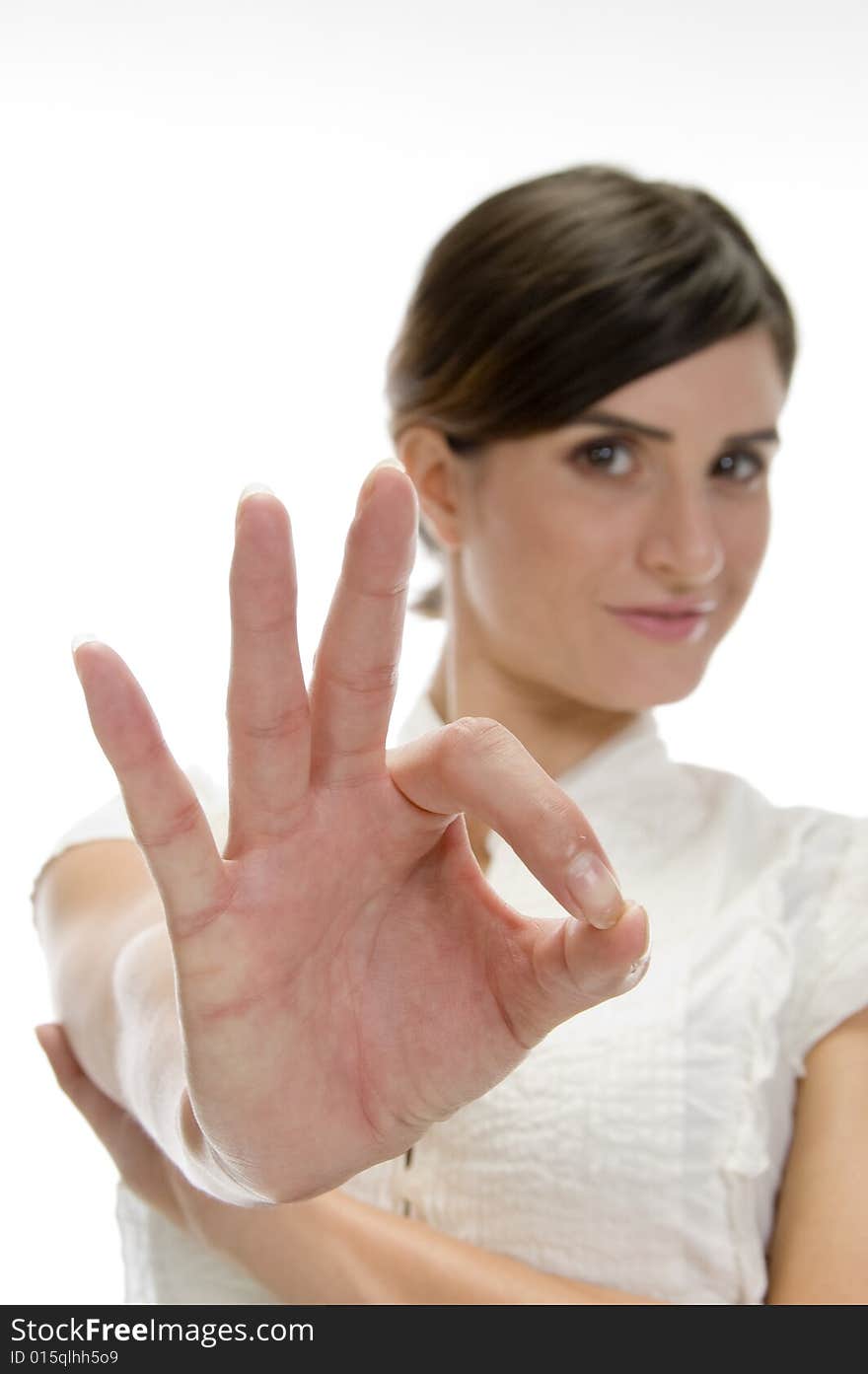 Lady showing ok sign on an isolated background