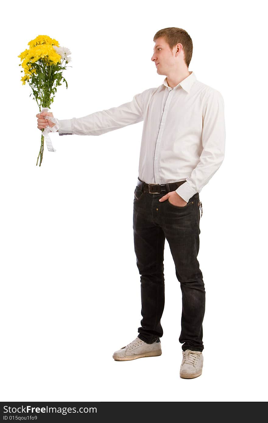 Man gives yellow flowers on white background