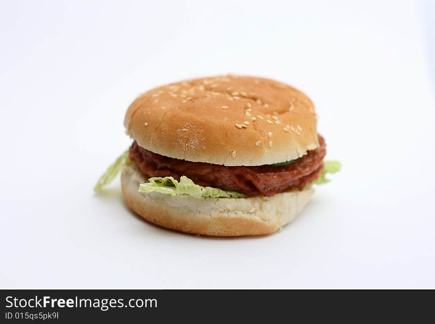 Hamburger with bread close up.