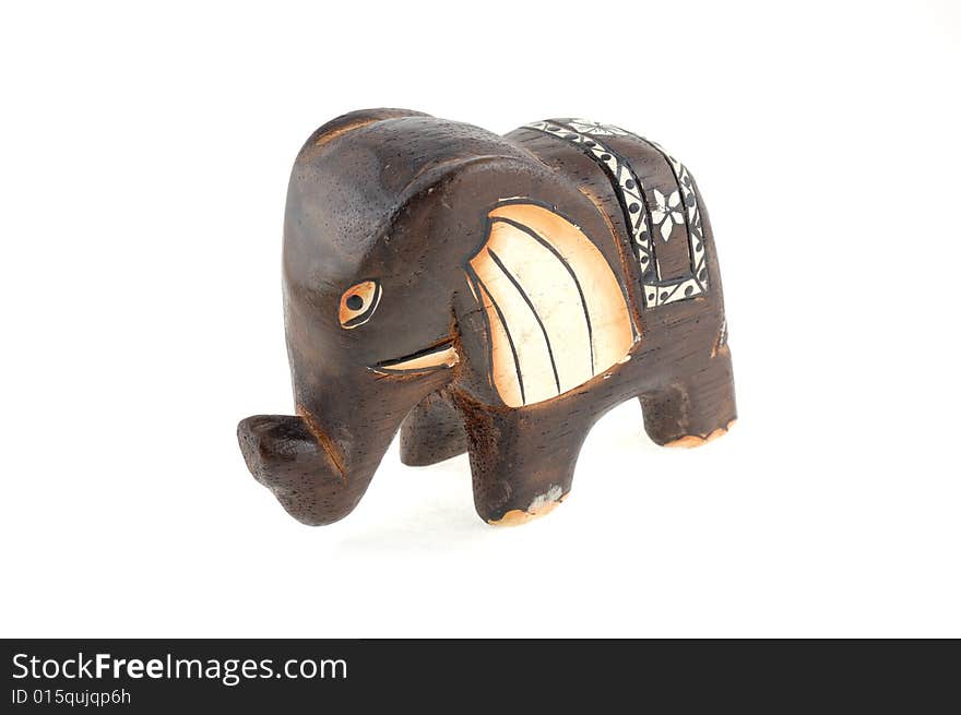 Wooden elephant on a white background