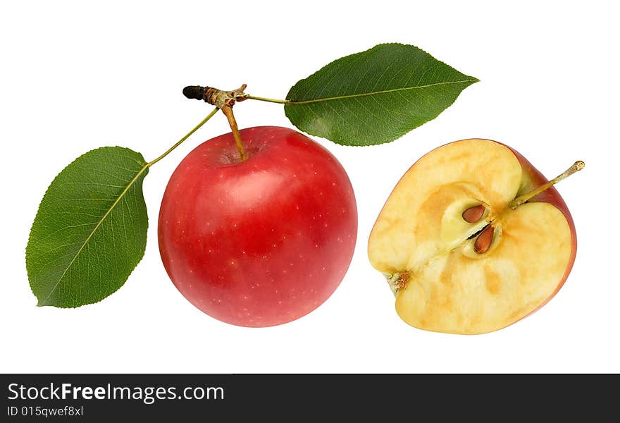 Red apple and half with green leaves isolated over white. Clipping path. Red apple and half with green leaves isolated over white. Clipping path.